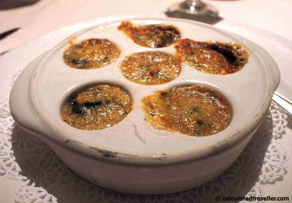 Image result for beautiful escargot dish on a cruise ship