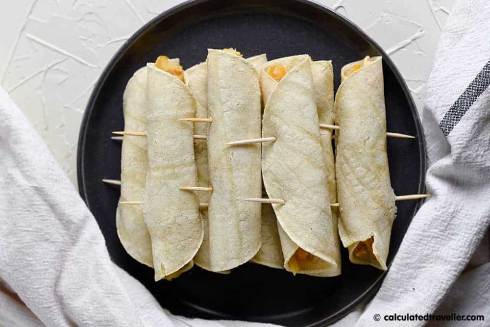 Taquitos filled and ready for frying