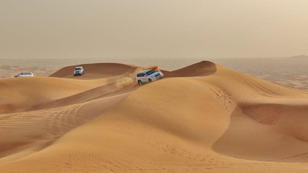 dubai tourist need to know Cars driving in the Dubai desert