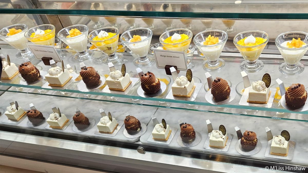 Display case of decadent desserts in the Emporium Marketplace
